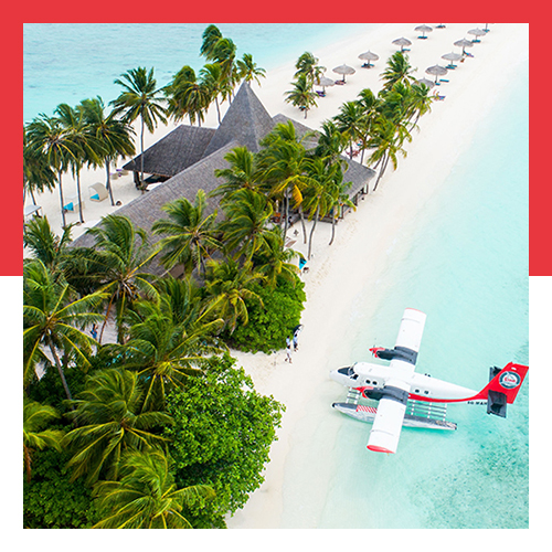 Sea plane flying above islands