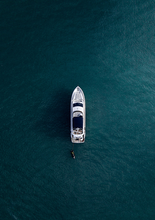 Aerial view directly above a luxury sailing yacht